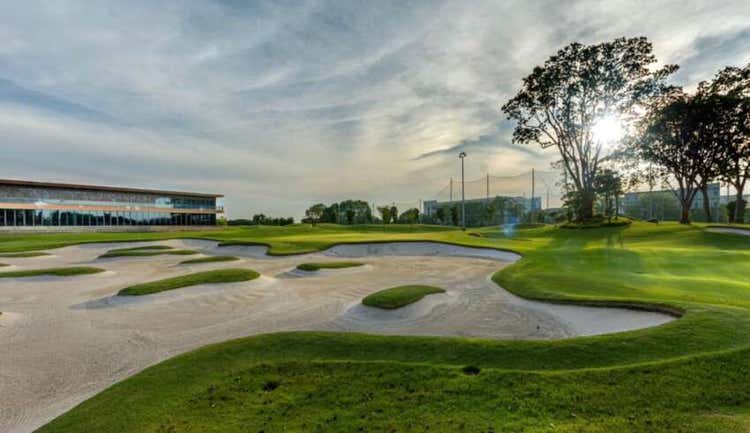 A golf course with sand bunkers AI-generated content may be incorrect.